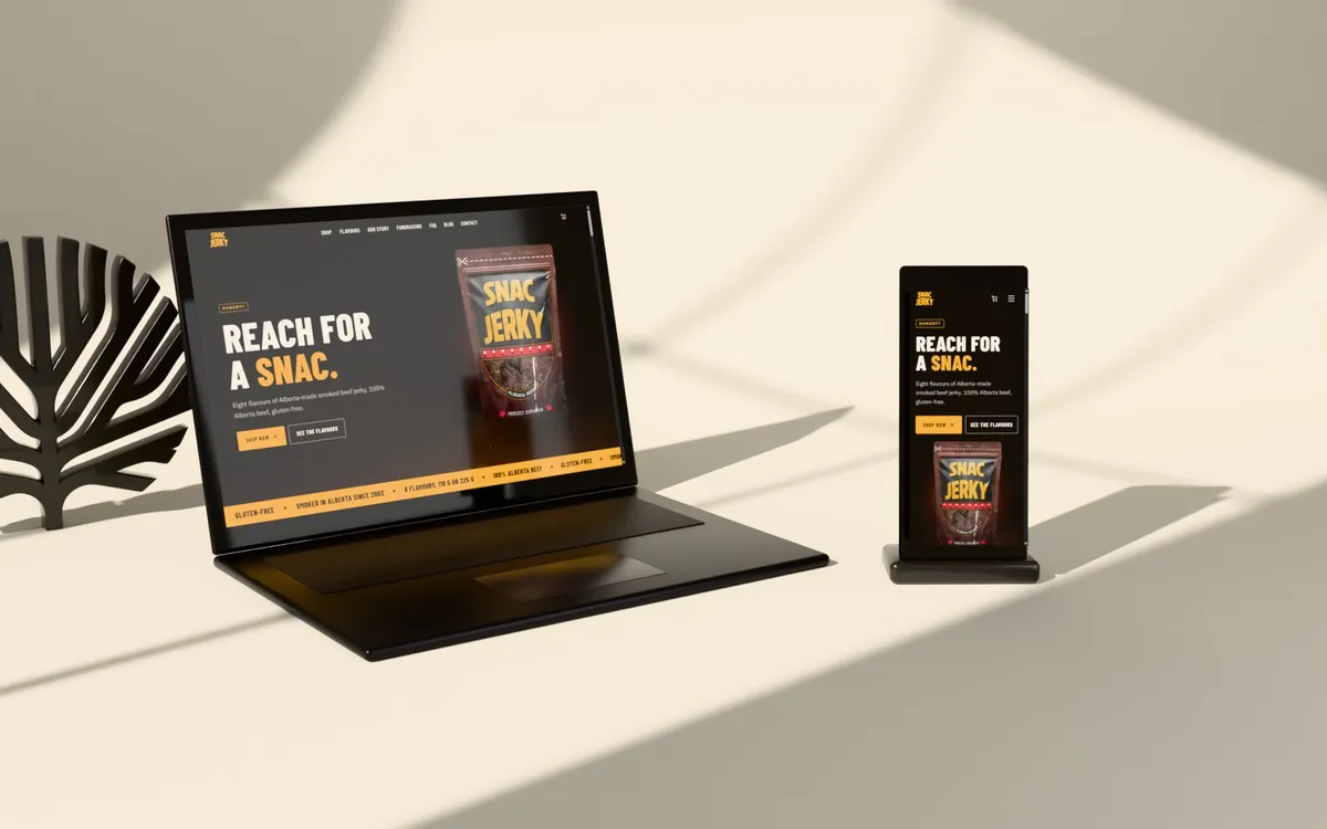 SNAC Jerky website on a laptop and phone